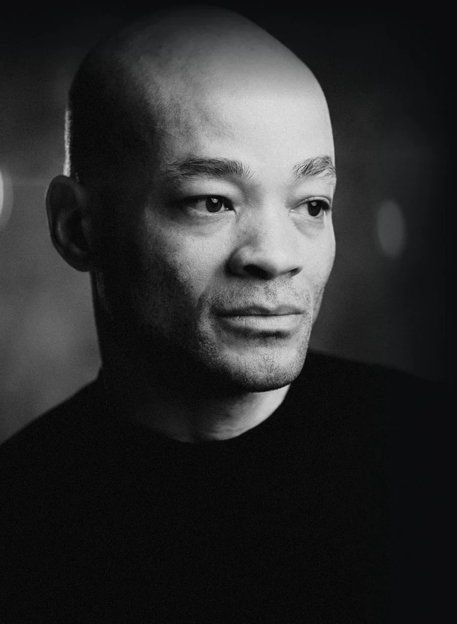 Marcel Patillo, lit from camera left against deep shadow